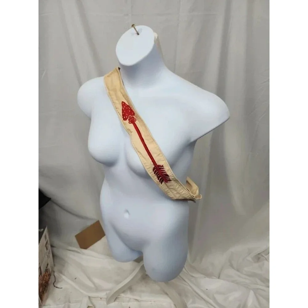 Boy scouts arriw sash 54 inches long